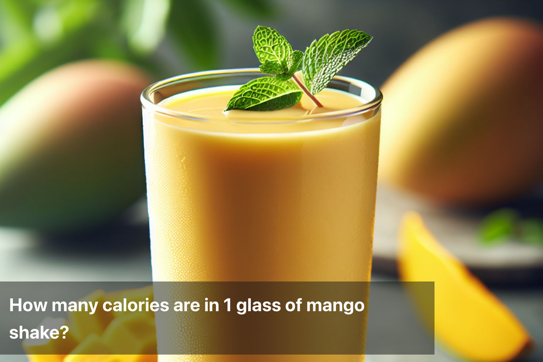 Delicious mango shake garnished with mint leaves and fresh mango pieces