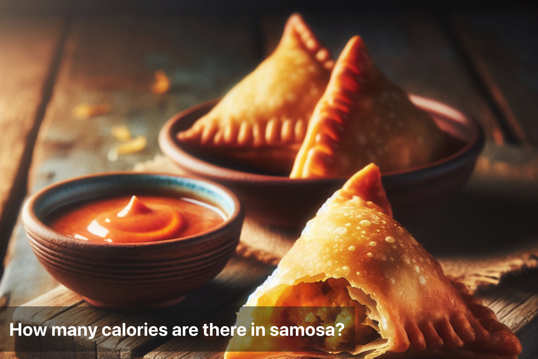 Delicious samosas served with tangy sauce on a wooden table.