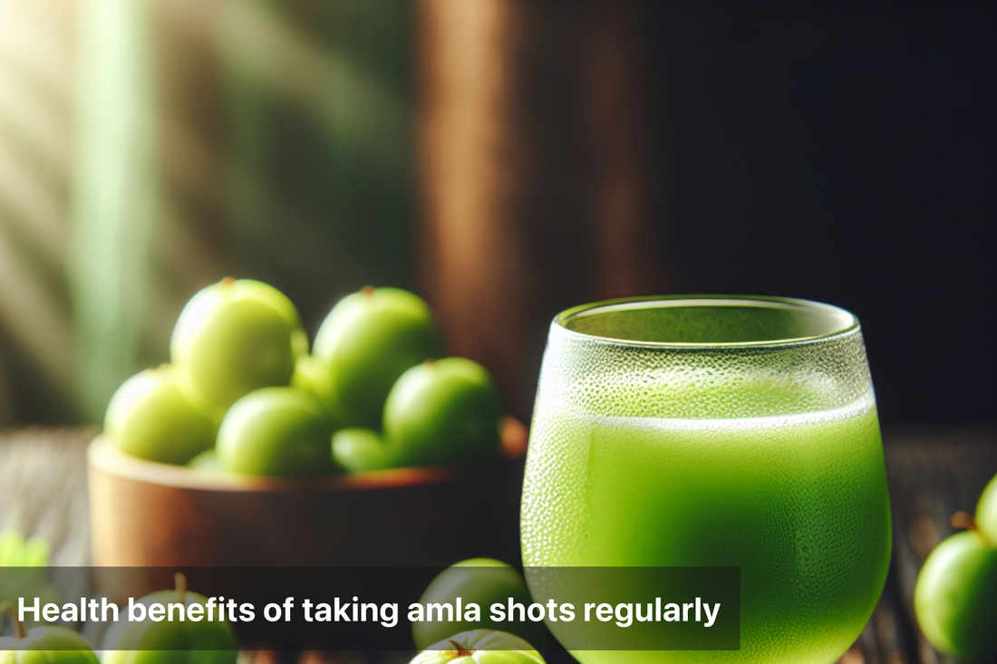 Amla shots in a glass with fresh amla fruits on the table