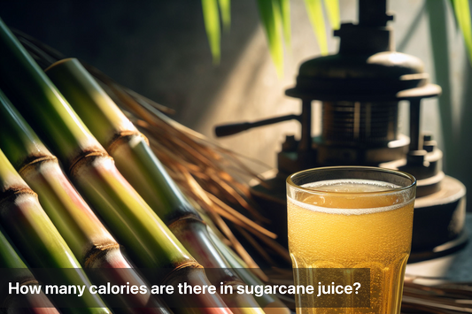 Fresh sugarcane juice in a glass with sugarcane stalks