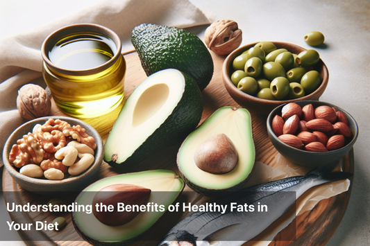 Healthy fats including avocados, nuts, and olive oil on a wooden board.