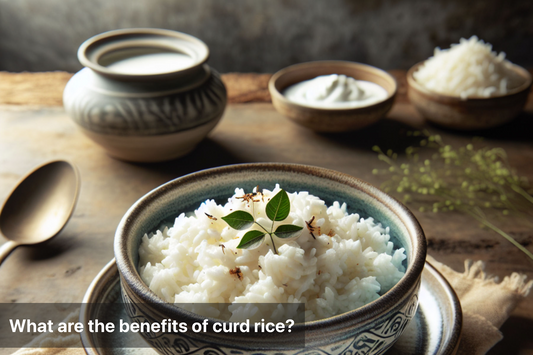 Curd rice served with garnishes in traditional bowls