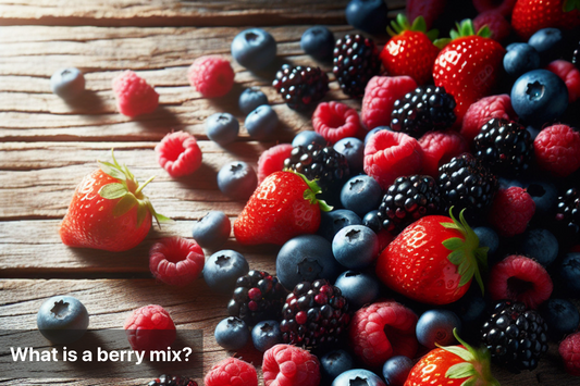 A vibrant assortment of mixed berries on a wooden surface.